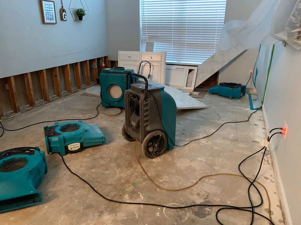 Dehumidifier in flood-cut room for Water Extraction & Removal in Clay